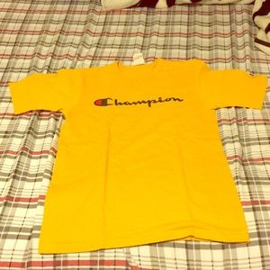 yellow champion shirt